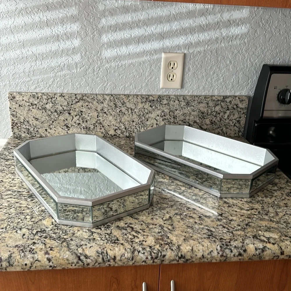 Two glass mirror trays, 16 inches wide 10 inches long